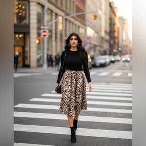 J. Crew midi pleated animal print skirt.